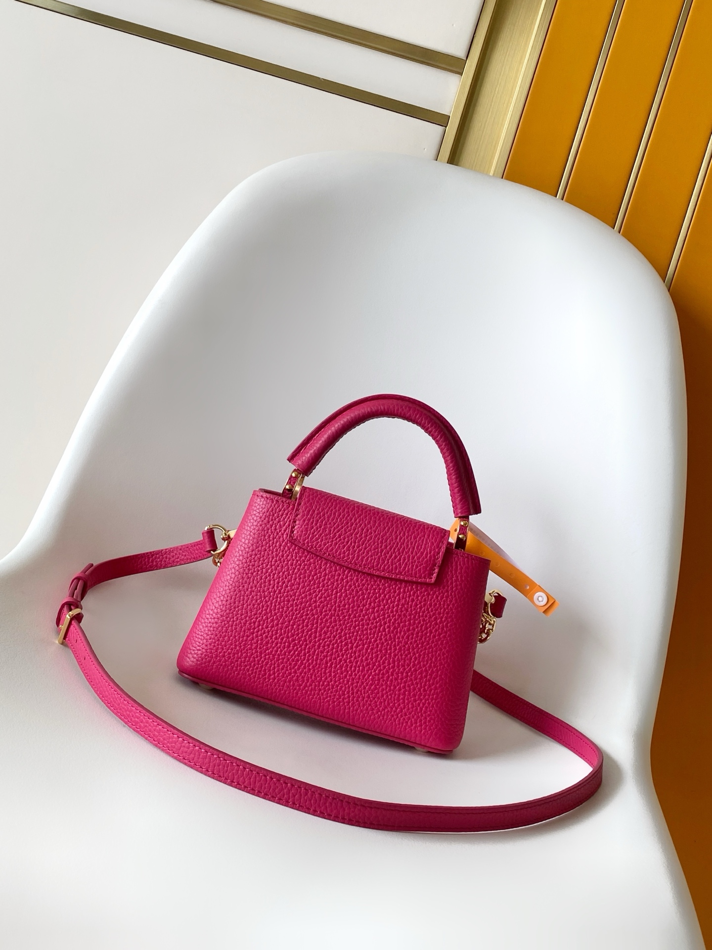 Capucines Mini Grained Taurillon leather top BAG