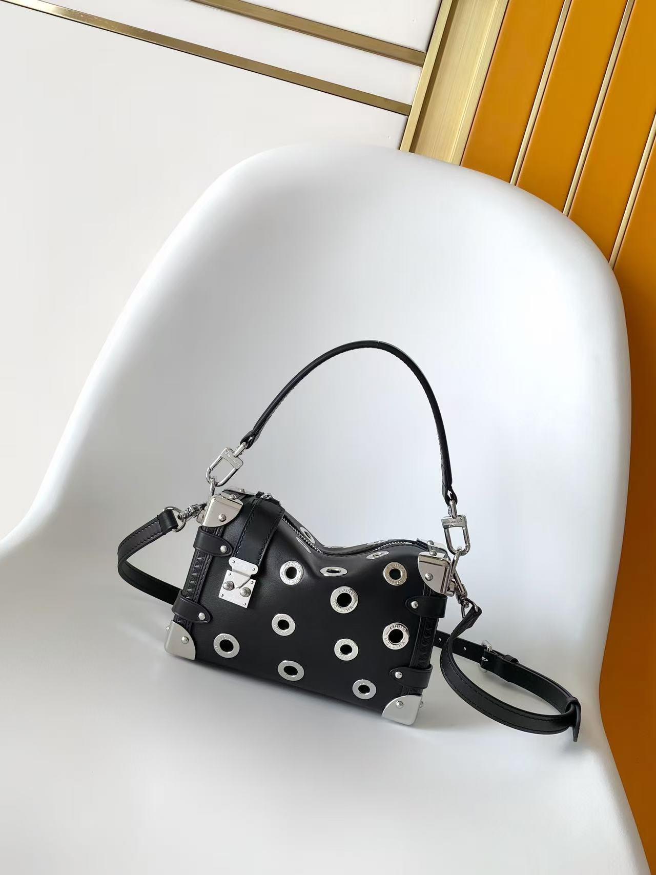 louis vuitton black eyelet side trunk pm
