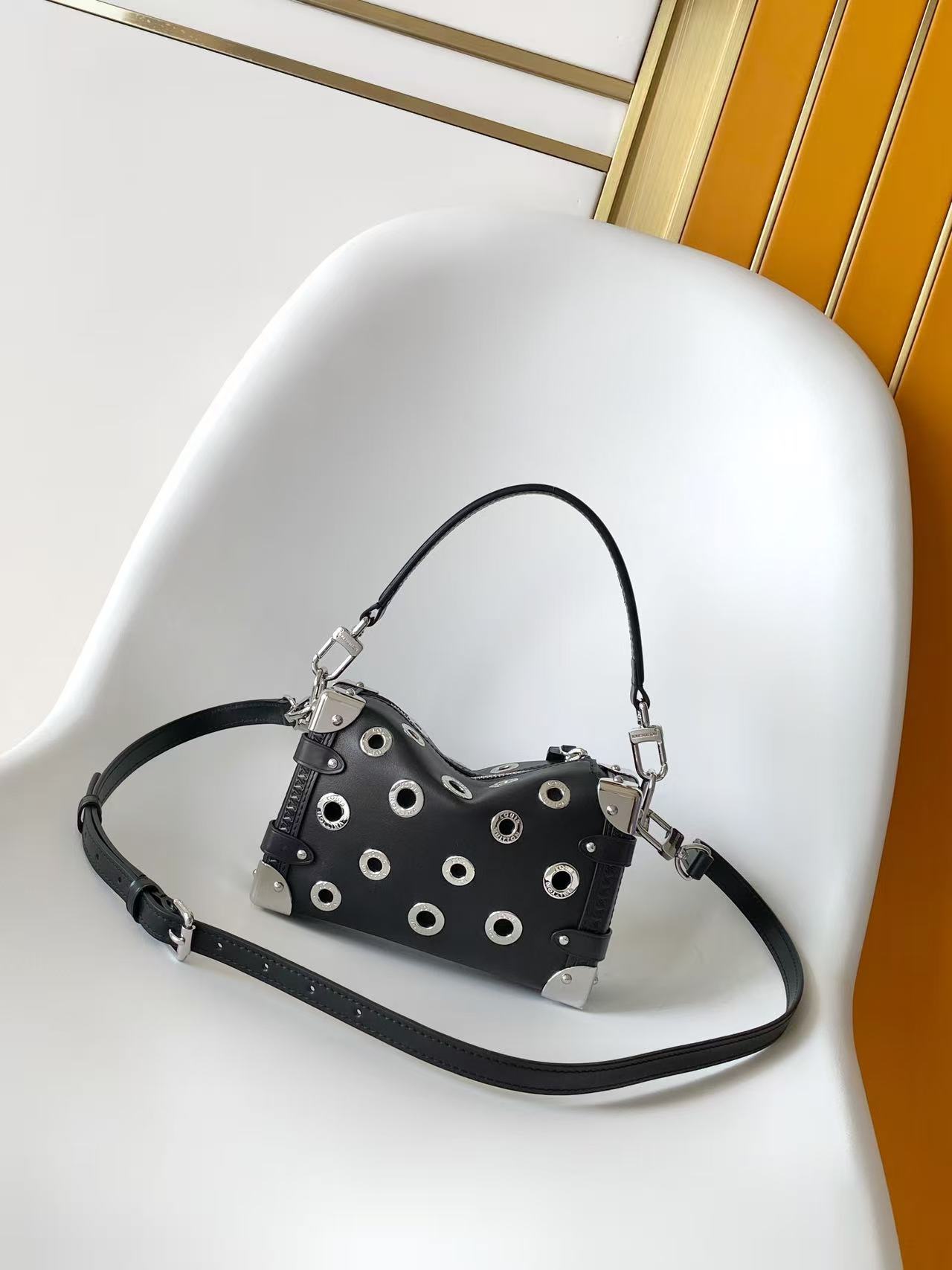 louis vuitton black eyelet side trunk pm