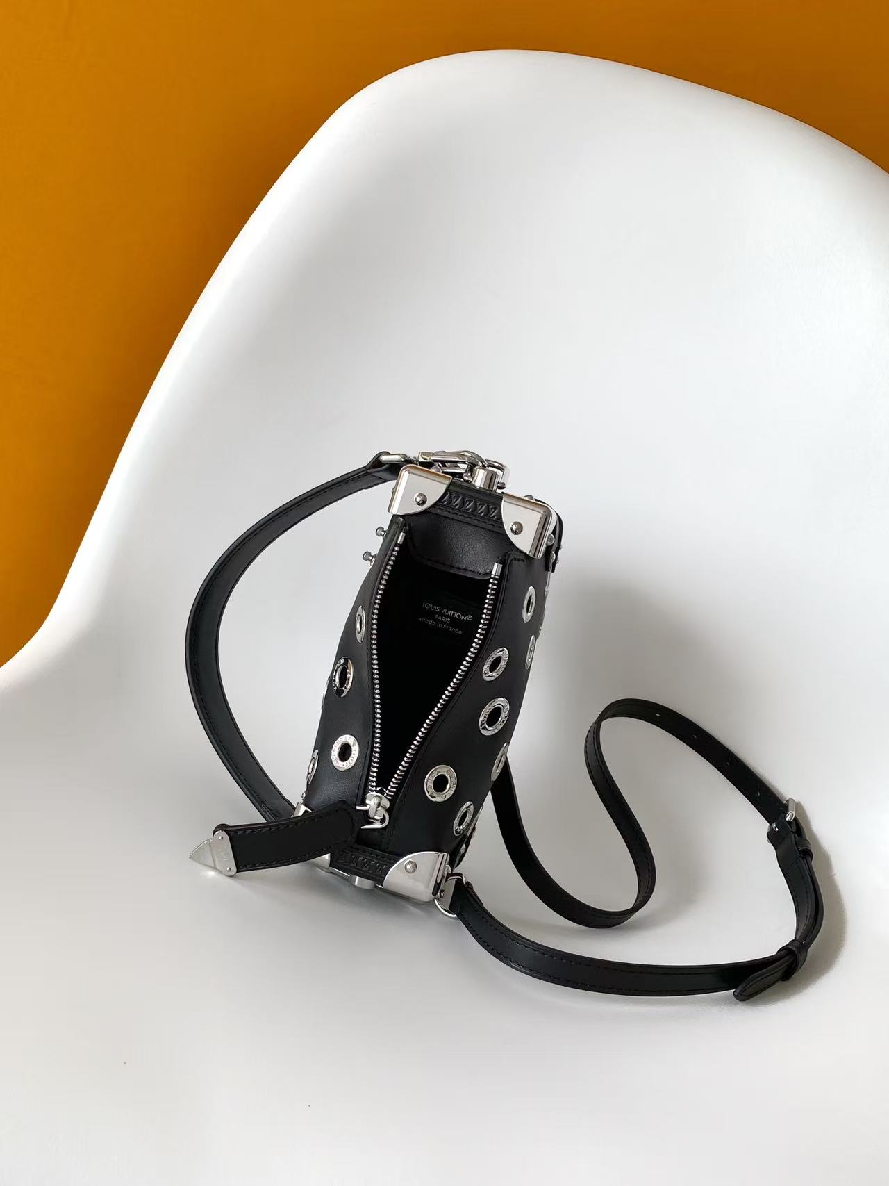 louis vuitton black eyelet side trunk pm