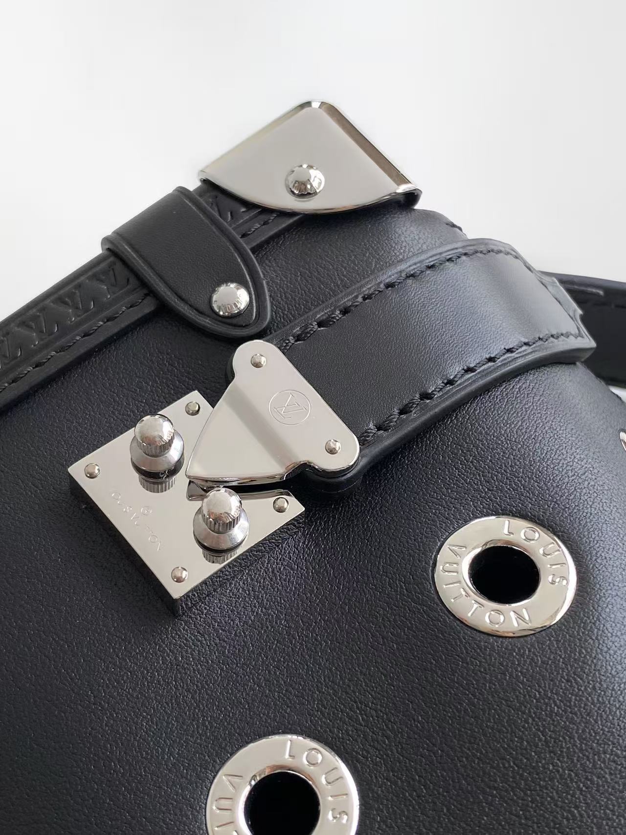 louis vuitton black eyelet side trunk pm