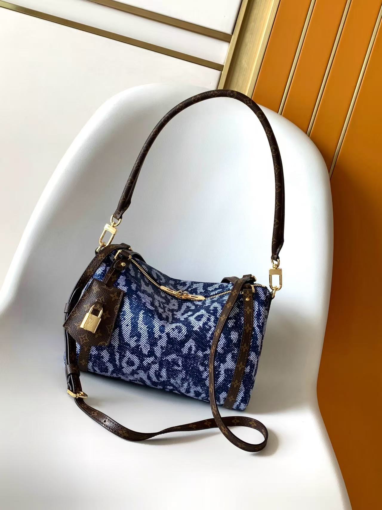louis vuitton express wild denim bag