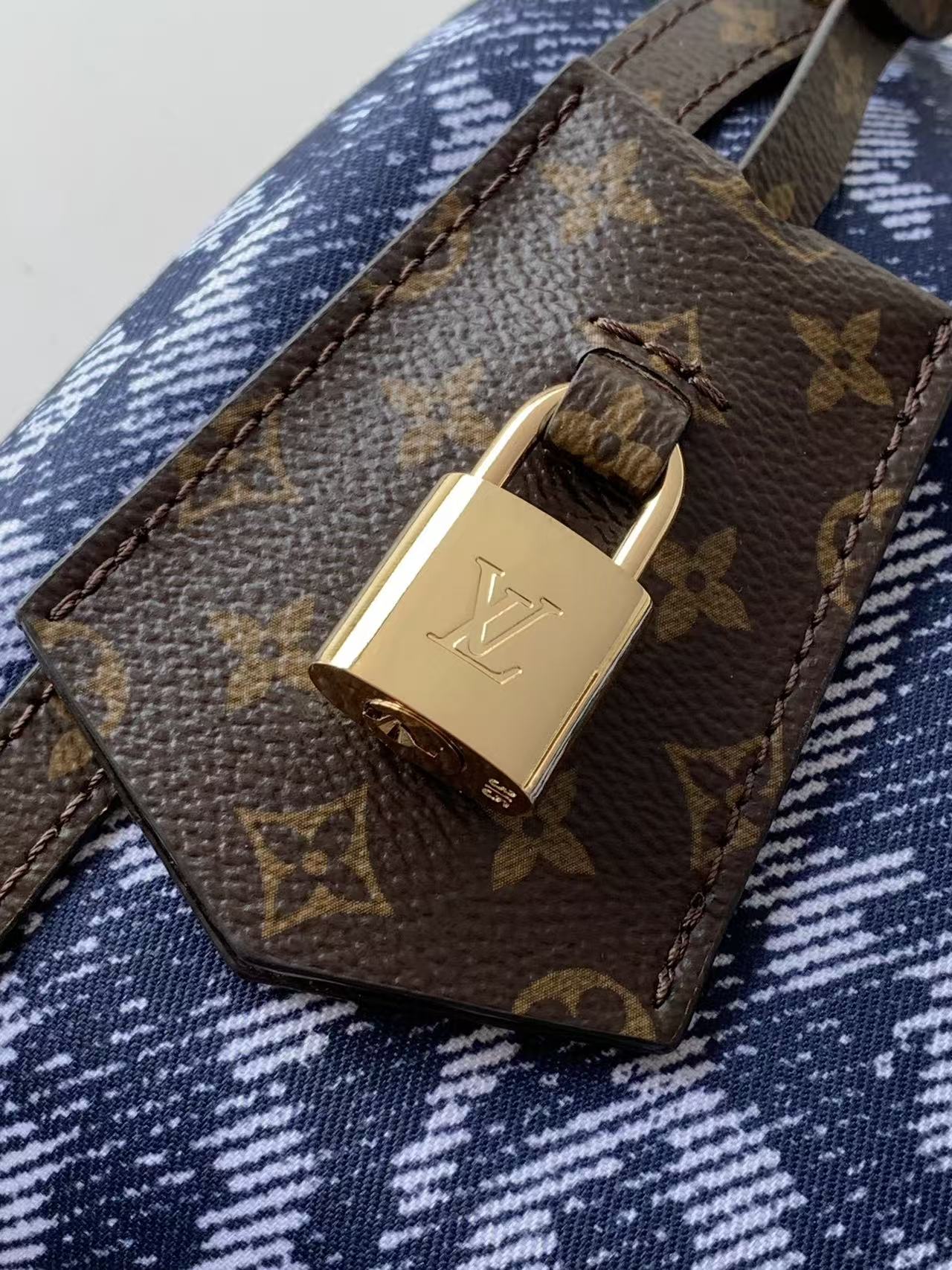 louis vuitton express wild denim bag