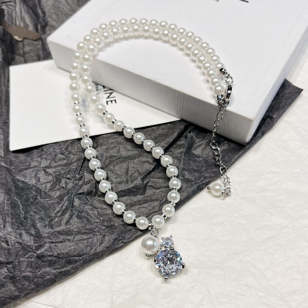 Celine Moon Phase Necklace: Celestial Motif with Crystal Accents 12 a1713082062675 8128