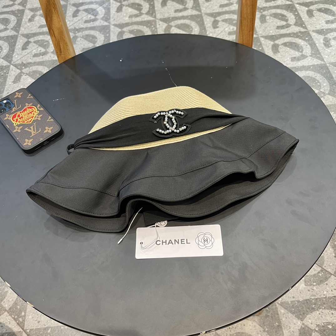 Sombrero de paja de ala ancha Chanel con lazo grande para mujer, para salir, estilo vacacional, protección solar, favor…