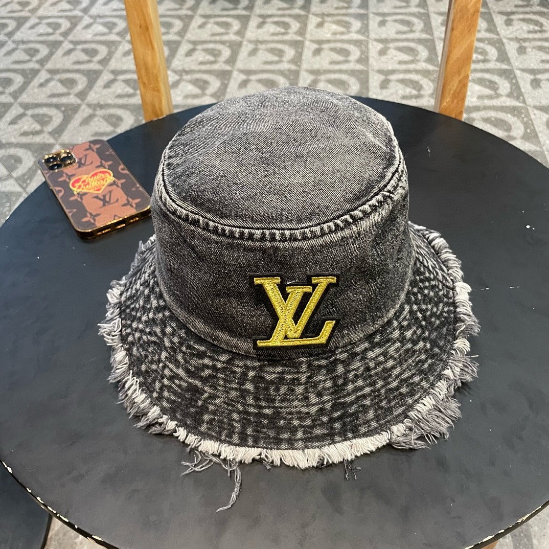 Sombrero de pescador de Louis Vuitton LV de nuevo estilo de mostrador con flecos de mezclilla, simple y elegante, unise…