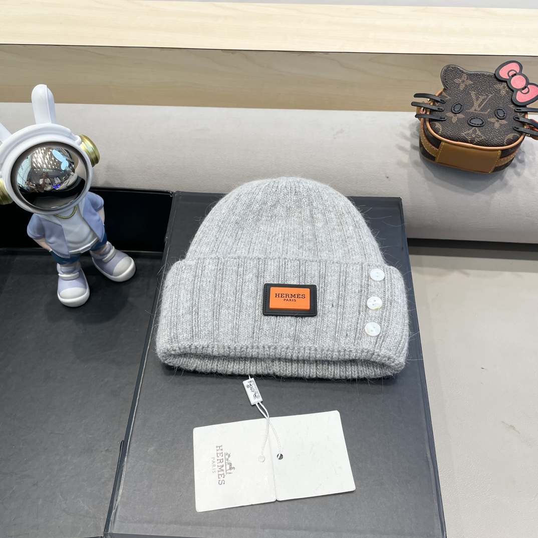 Hermès sombrero de punto con botones y agujeros de edición limitada de diseñador, cálido y protector de orejas, gorro d…