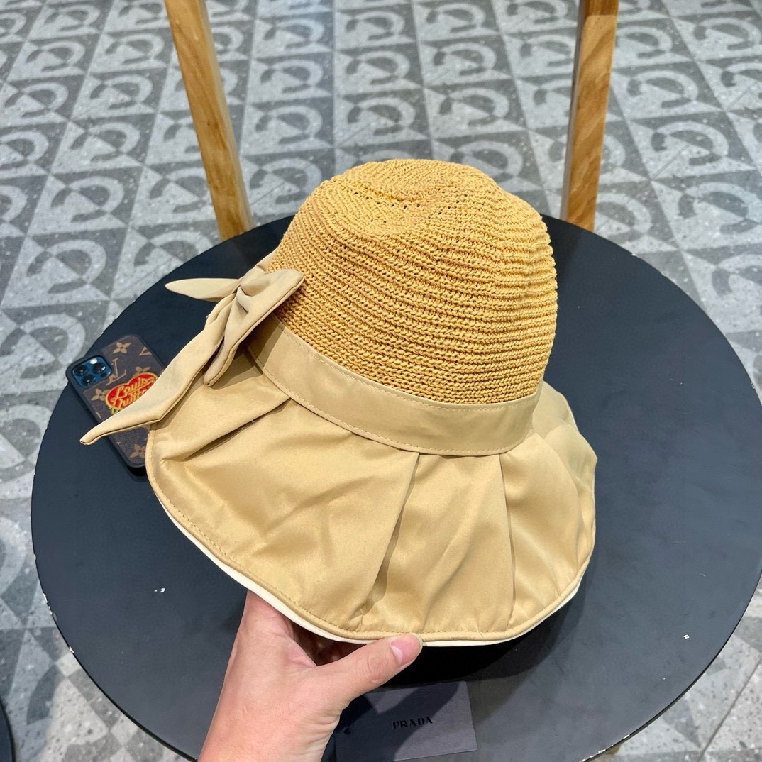  PRADA普拉达 黑胶帽子女款春夏出游防紫外线遮阳防晒帽大檐蝴蝶结渔夫帽太阳帽