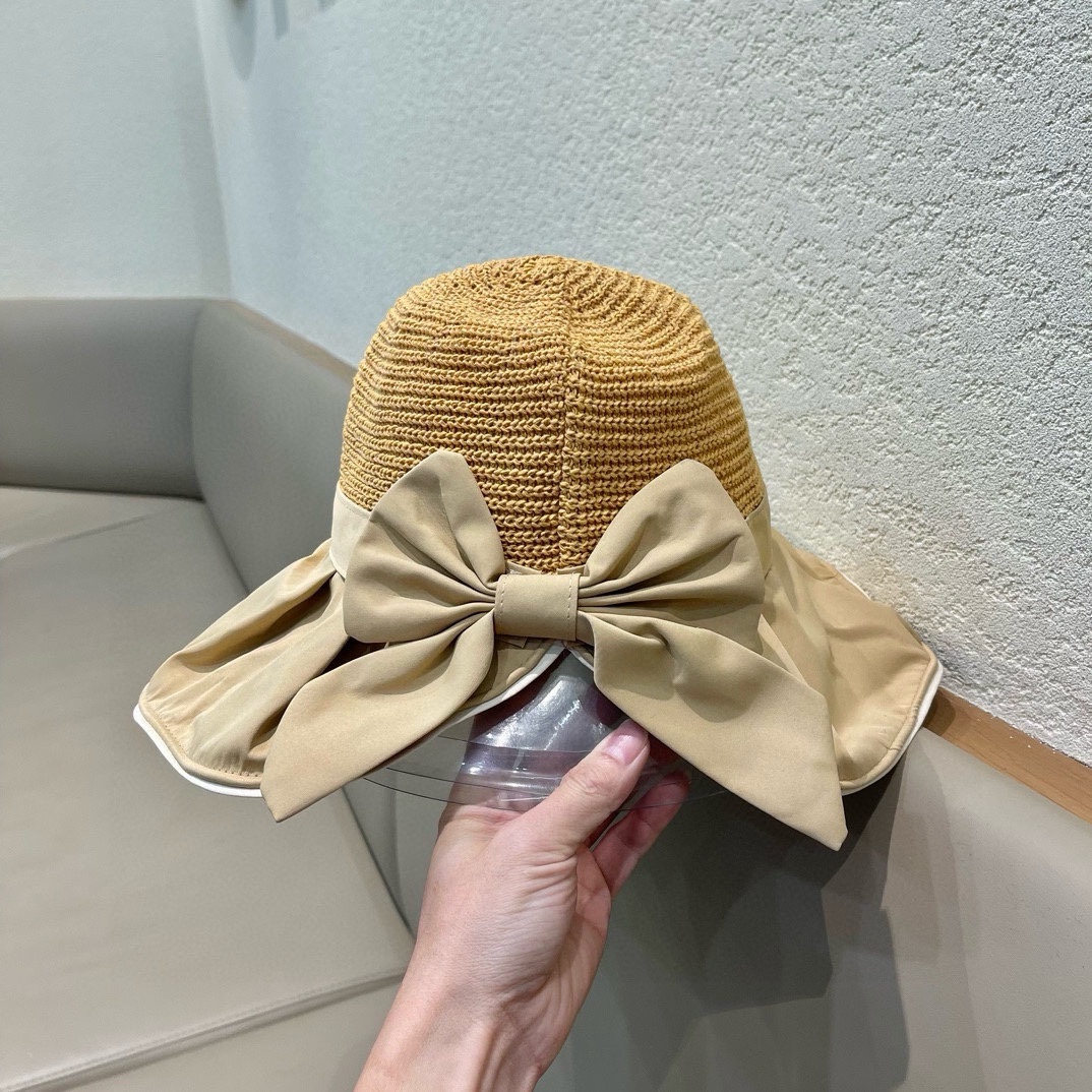  PRADA普拉达 黑胶帽子女款春夏出游防紫外线遮阳防晒帽大檐蝴蝶结渔夫帽太阳帽