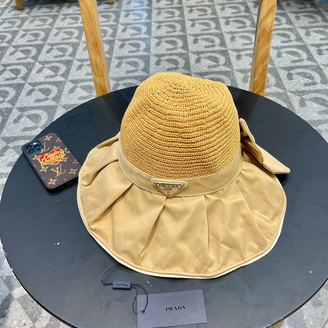  PRADA普拉达 黑胶帽子女款春夏出游防紫外线遮阳防晒帽大檐蝴蝶结渔夫帽太阳帽