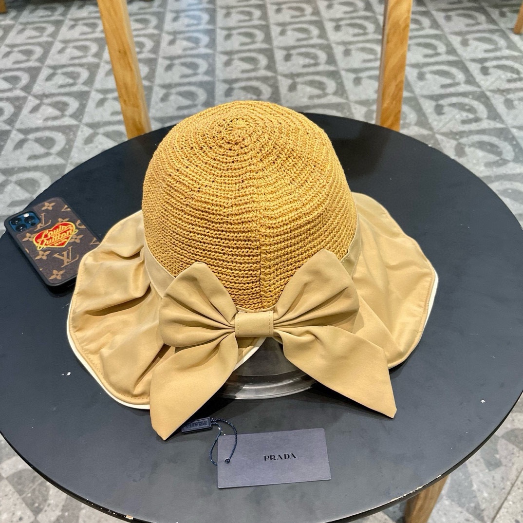  PRADA普拉达 黑胶帽子女款春夏出游防紫外线遮阳防晒帽大檐蝴蝶结渔夫帽太阳帽