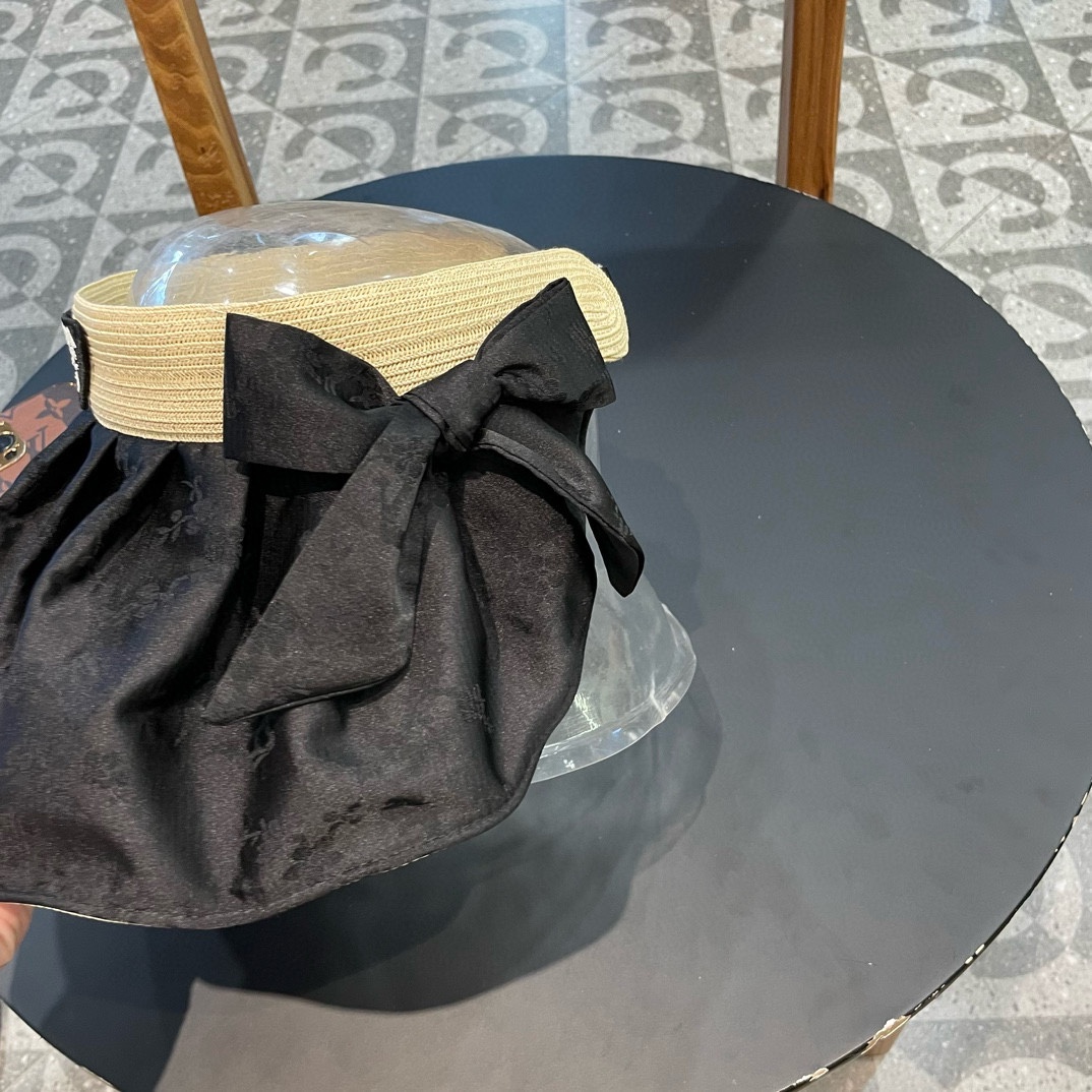   普拉达Prada蝴蝶结空顶帽子女款新款夏季拼接草编遮阳帽户外国风防晒帽潮