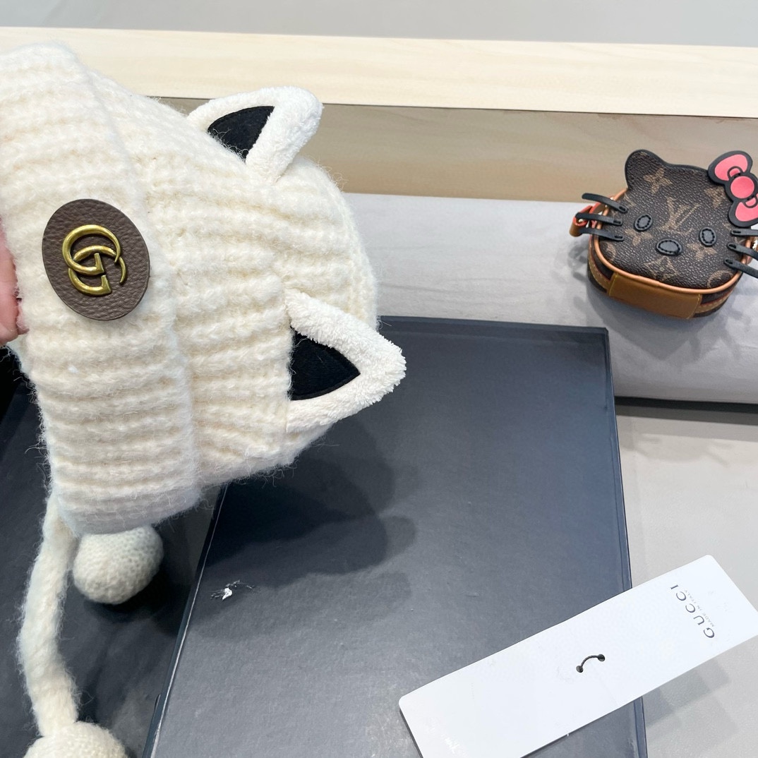  GUCCI古奇猫耳朵针织帽秋冬季保暖毛线帽韩版可爱长辫子休闲护耳帽 GUCCI古奇猫耳朵针织帽秋冬季保