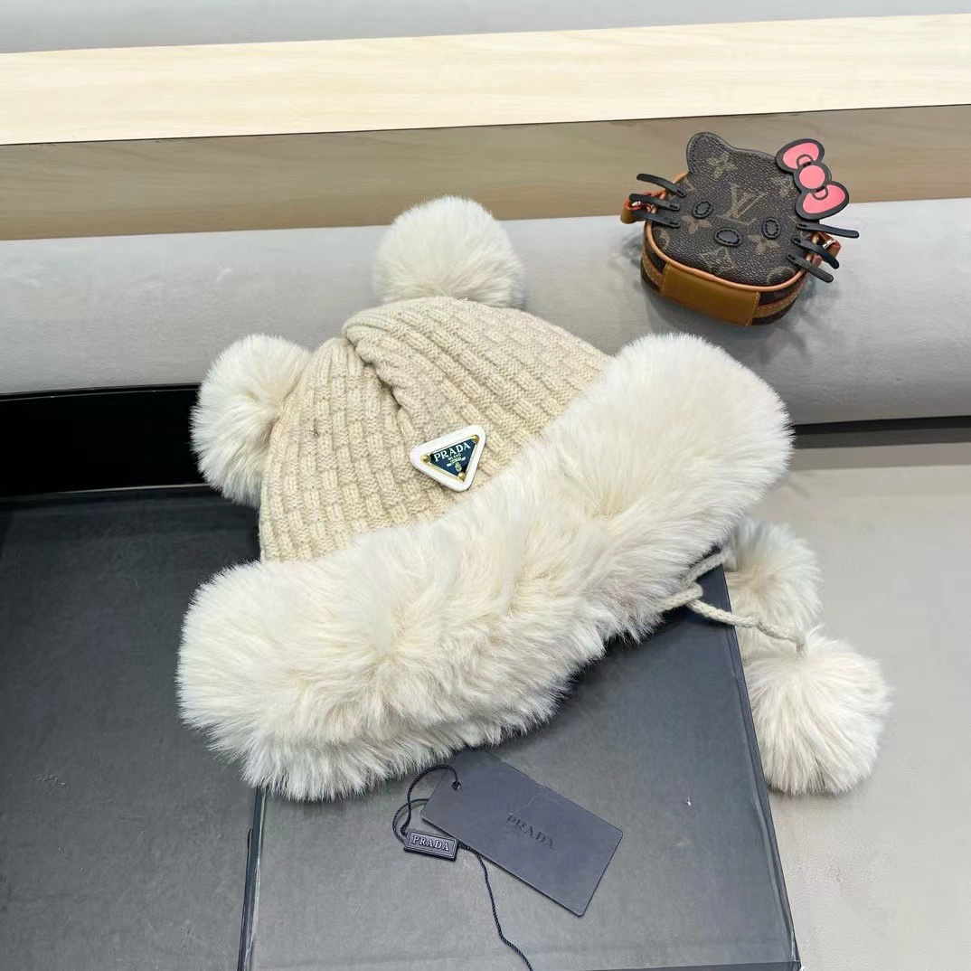 普拉达Prada加厚针织毛线帽子女士冬季可爱毛球套头帽保暖加绒护耳防寒雷锋帽