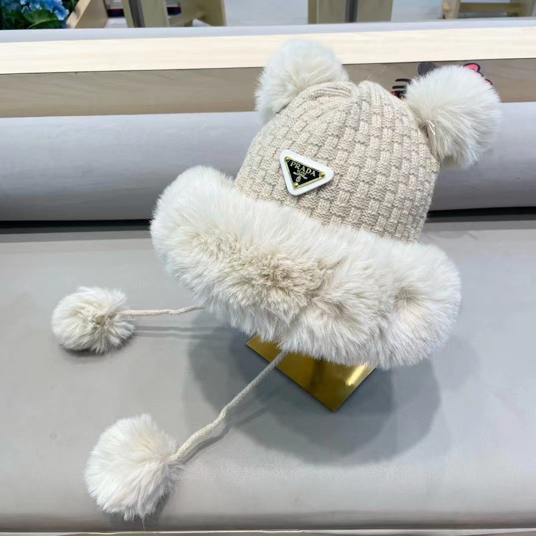 普拉达Prada加厚针织毛线帽子女士冬季可爱毛球套头帽保暖加绒护耳防寒雷锋帽