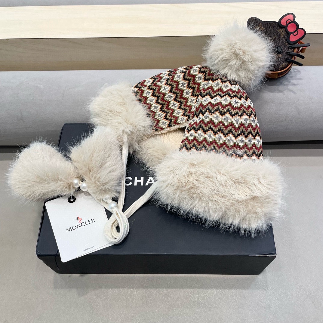 moncler名族风蒙古帽子女可爱毛绒吊球系带护耳帽冬季加厚防寒保暖雷