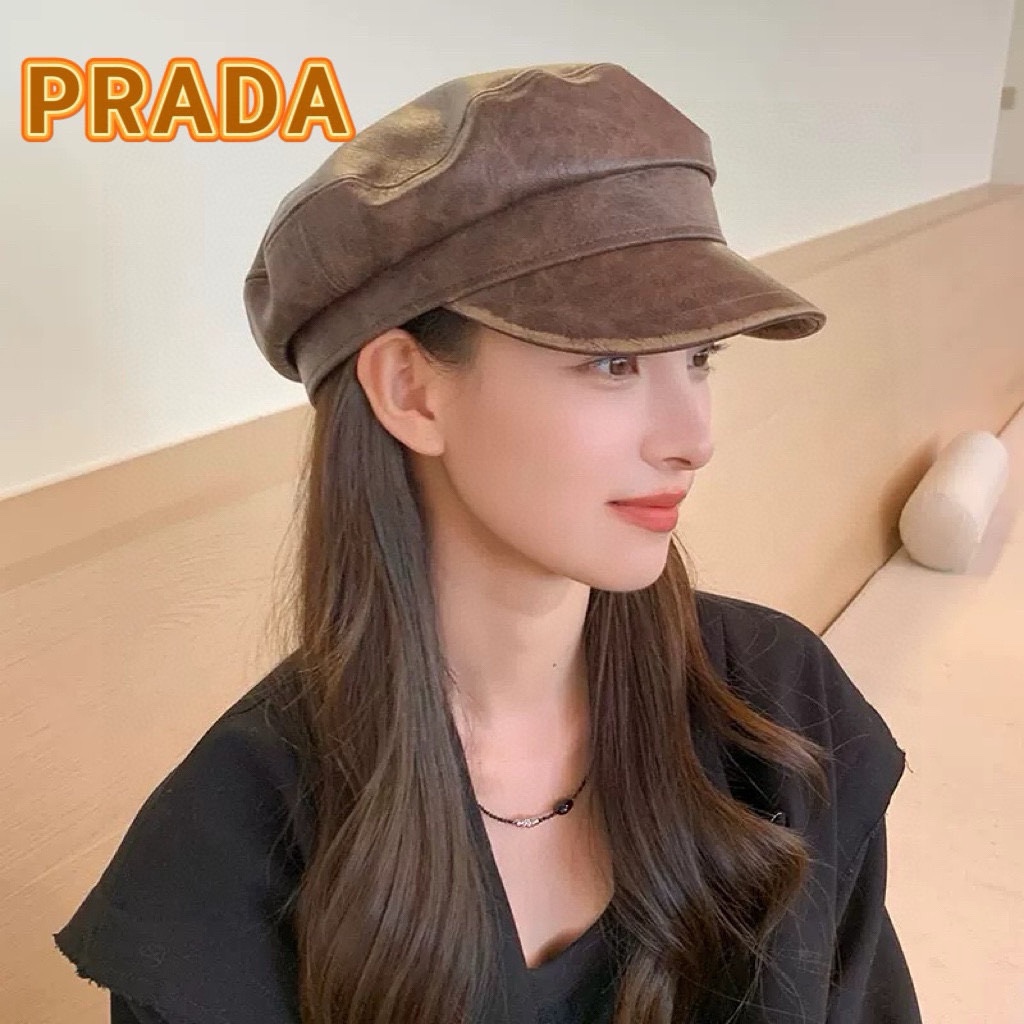 PRADA普拉达 显脸小气质Pu皮帽鸭舌帽子女秋冬新款复古文艺百搭黑色八角贝雷帽