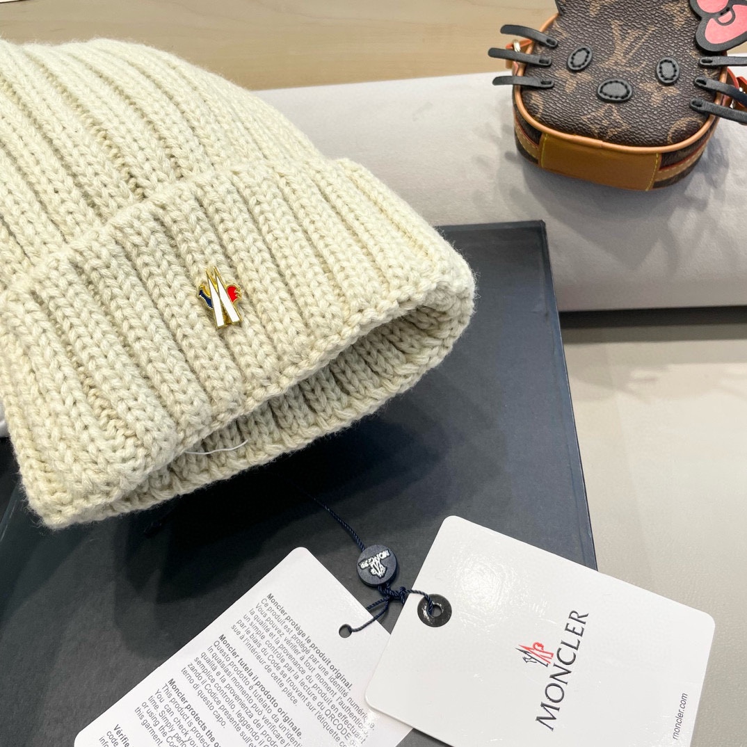   moncler迪丽热巴同款黑色毛球针织帽新款百搭防寒保暖毛线帽子冷帽