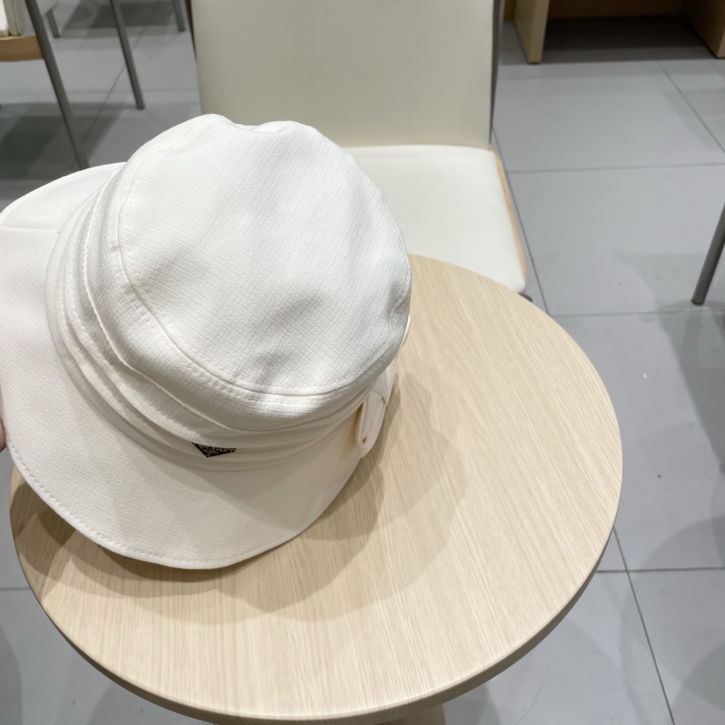  PRADA普拉达2025春季新款蝴蝶结渔夫帽子女韩版时尚百搭显脸小薄款防晒遮阳帽