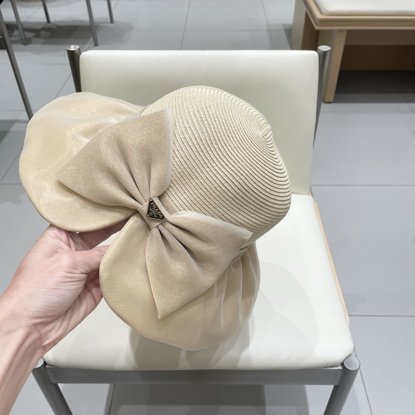  Prada普拉达夏季防晒帽女子2025新款出游防紫外线大檐遮阳脸蝴蝶结太阳渔夫帽