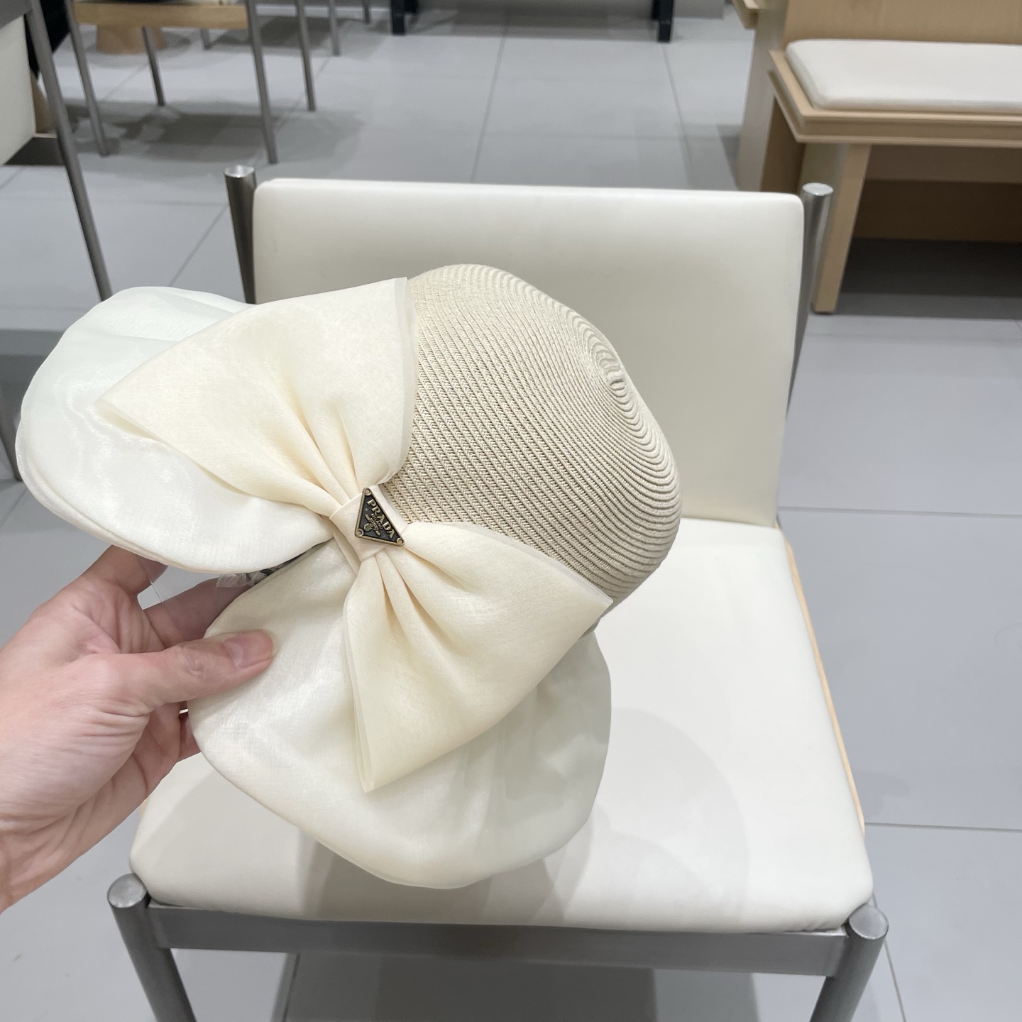  Prada普拉达夏季防晒帽女子2025新款出游防紫外线大檐遮阳脸蝴蝶结太阳渔夫帽