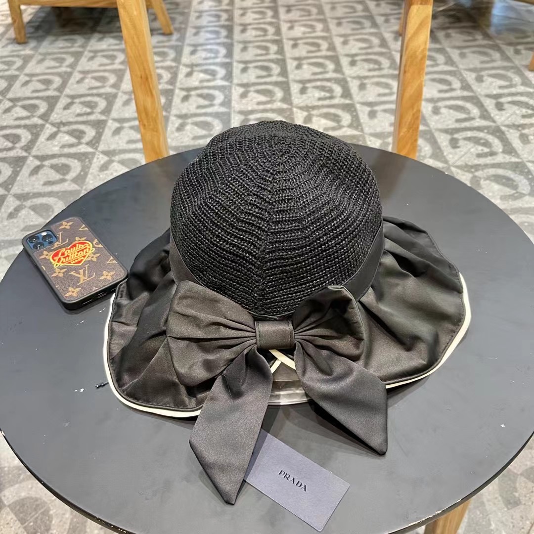  PRADA普拉达 黑胶帽子女款春夏出游防紫外线遮阳防晒帽大檐蝴蝶结渔夫帽太阳帽