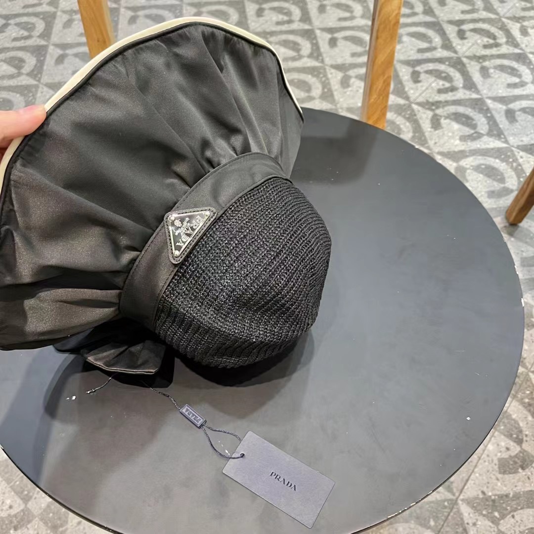  PRADA普拉达 黑胶帽子女款春夏出游防紫外线遮阳防晒帽大檐蝴蝶结渔夫帽太阳帽