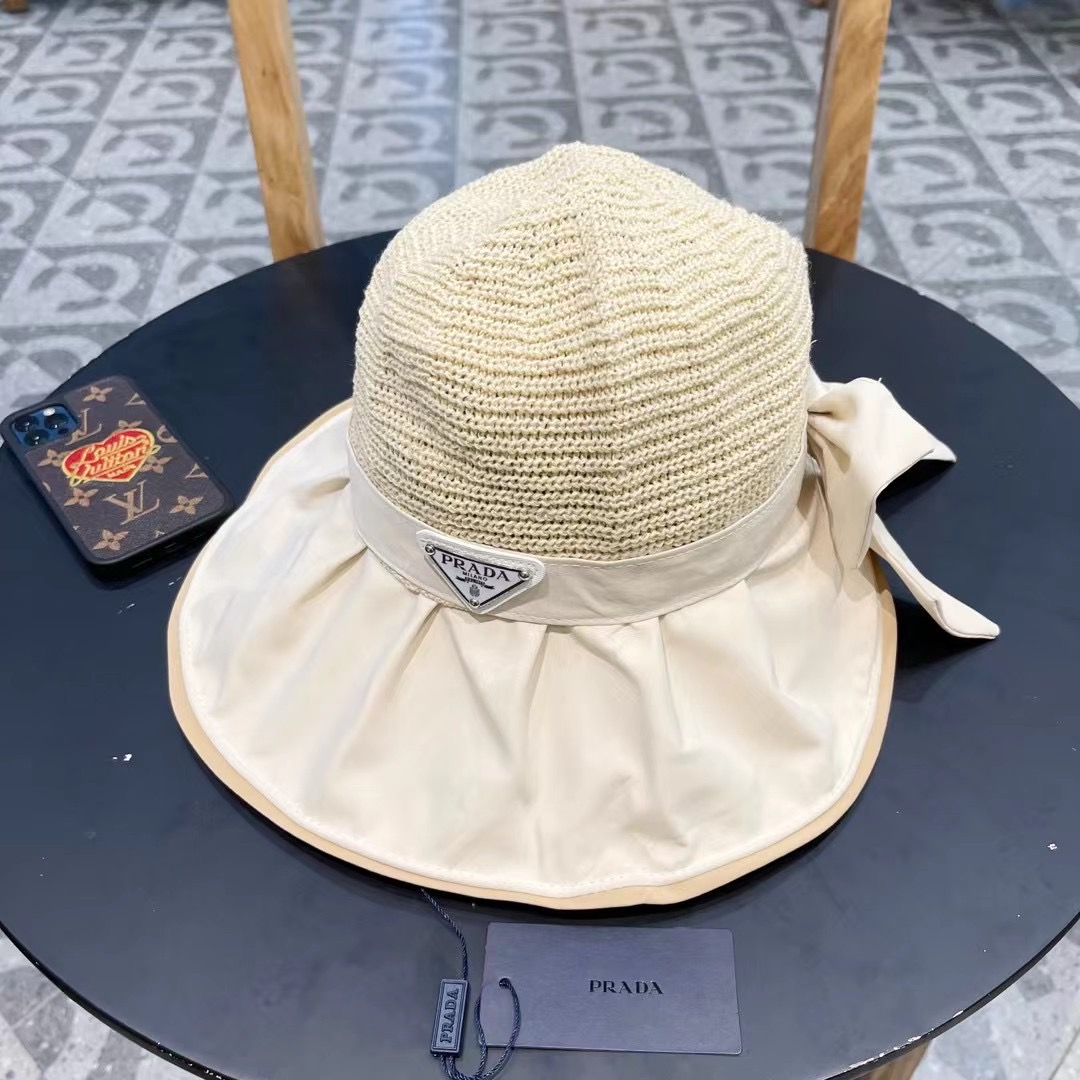  PRADA普拉达 黑胶帽子女款春夏出游防紫外线遮阳防晒帽大檐蝴蝶结渔夫帽太阳帽