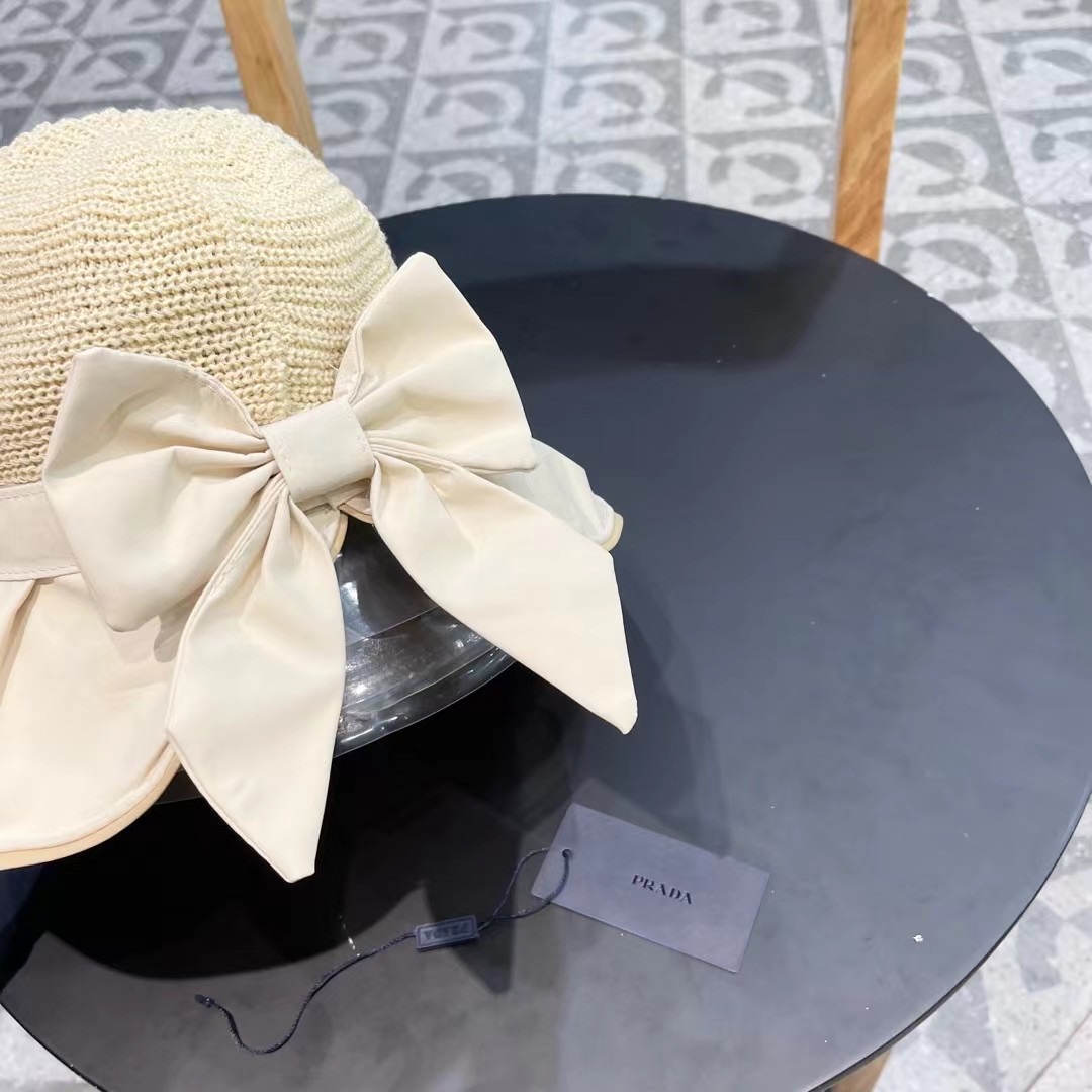  PRADA普拉达 黑胶帽子女款春夏出游防紫外线遮阳防晒帽大檐蝴蝶结渔夫帽太阳帽