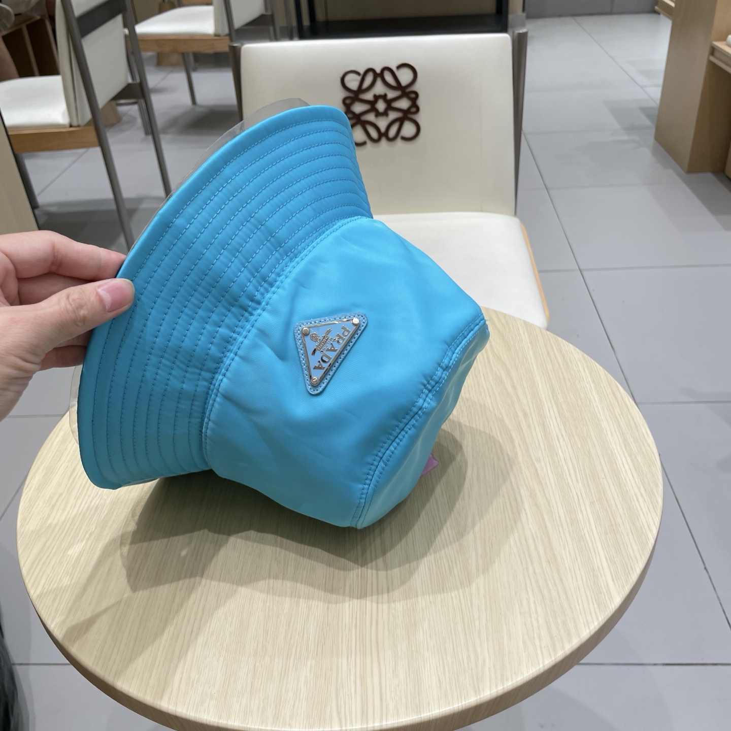  PRADA普拉达官网新款遮阳渔夫帽、防紫外线布帽，可折叠头围57cm