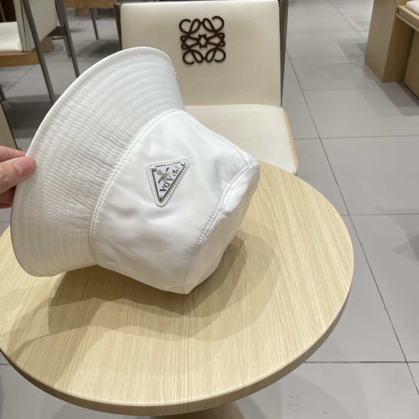  PRADA普拉达官网新款遮阳渔夫帽、防紫外线布帽，可折叠头围57cm