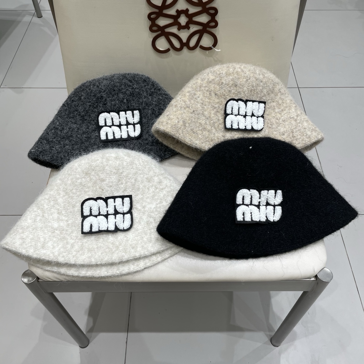 缪缪miumiu羊毛呢渔夫帽女秋冬百搭时尚洋气加厚保暖盆帽休闲气质显脸小