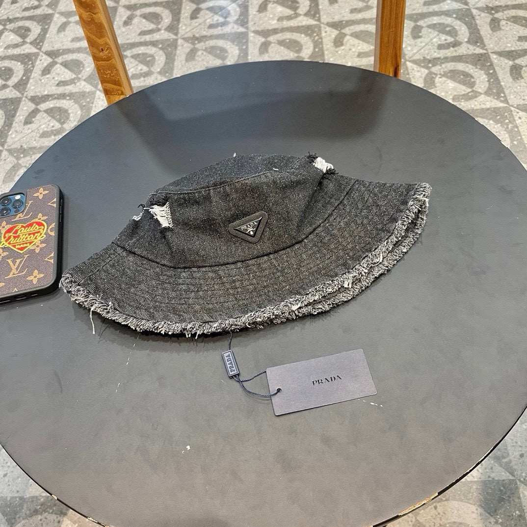  PRADA普拉达 做旧水洗牛仔渔夫帽子女破洞毛边设计街头小众盆帽潮