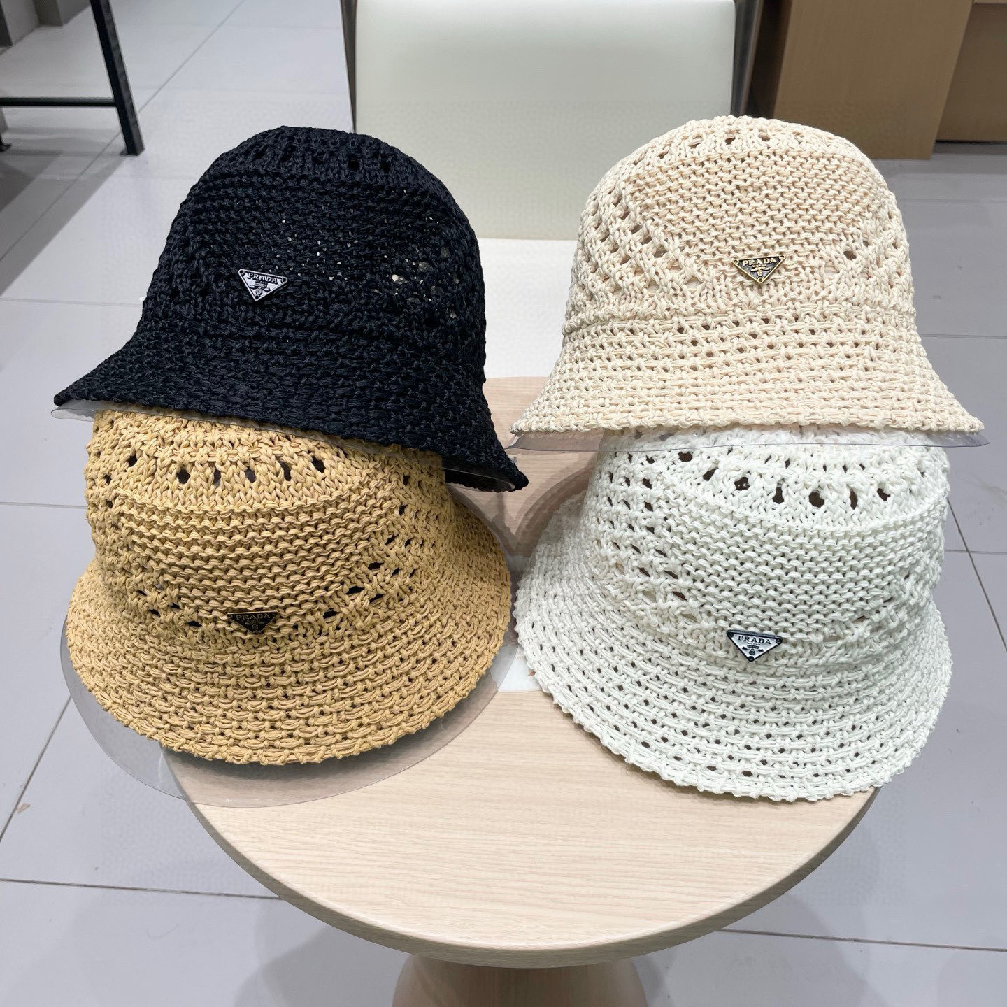  PRADA普拉达2025新款韩版遮阳渔夫帽女夏季纯色太阳帽镂空针织甜美显脸小盆帽