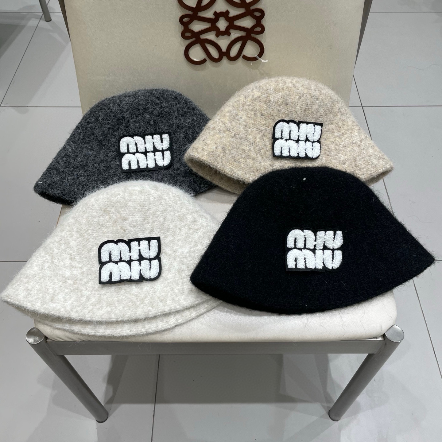 缪缪miumiu羊毛呢渔夫帽女秋冬百搭时尚洋气加厚保暖盆帽休闲气质显脸小