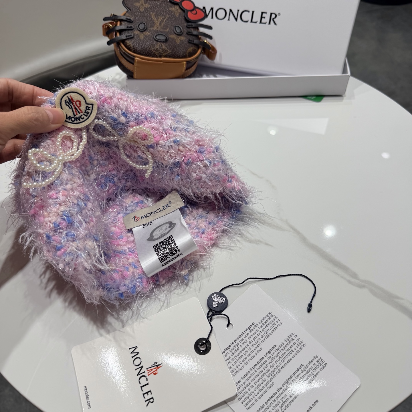 蒙口蝴蝶结毛绒渔夫帽子女2025新款冬季加厚保暖护耳针织帽大头围盆帽