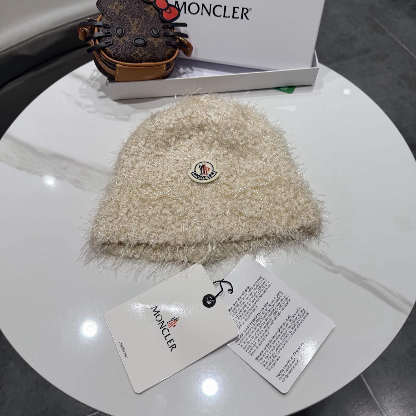 蒙口蝴蝶结毛绒渔夫帽子女2025新款冬季加厚保暖护耳针织帽大头围盆帽