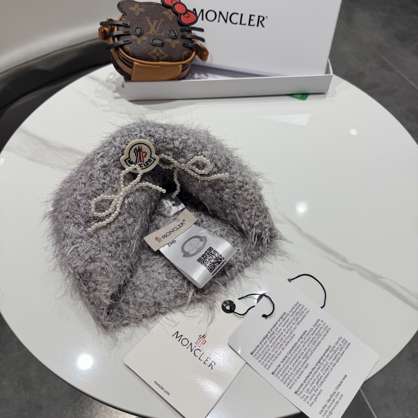 蒙口蝴蝶结毛绒渔夫帽子女2025新款冬季加厚保暖护耳针织帽大头围盆帽