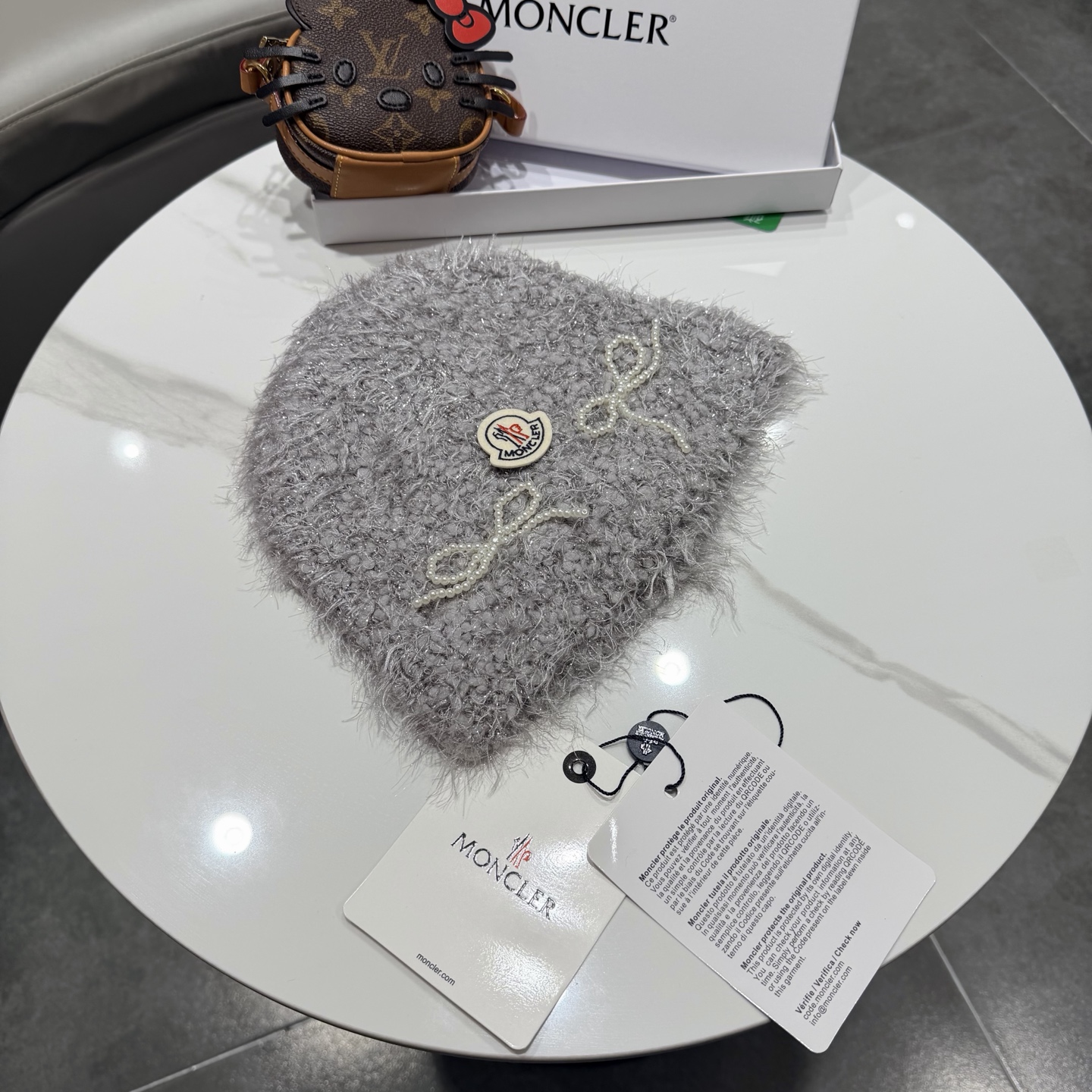 蒙口蝴蝶结毛绒渔夫帽子女2025新款冬季加厚保暖护耳针织帽大头围盆帽