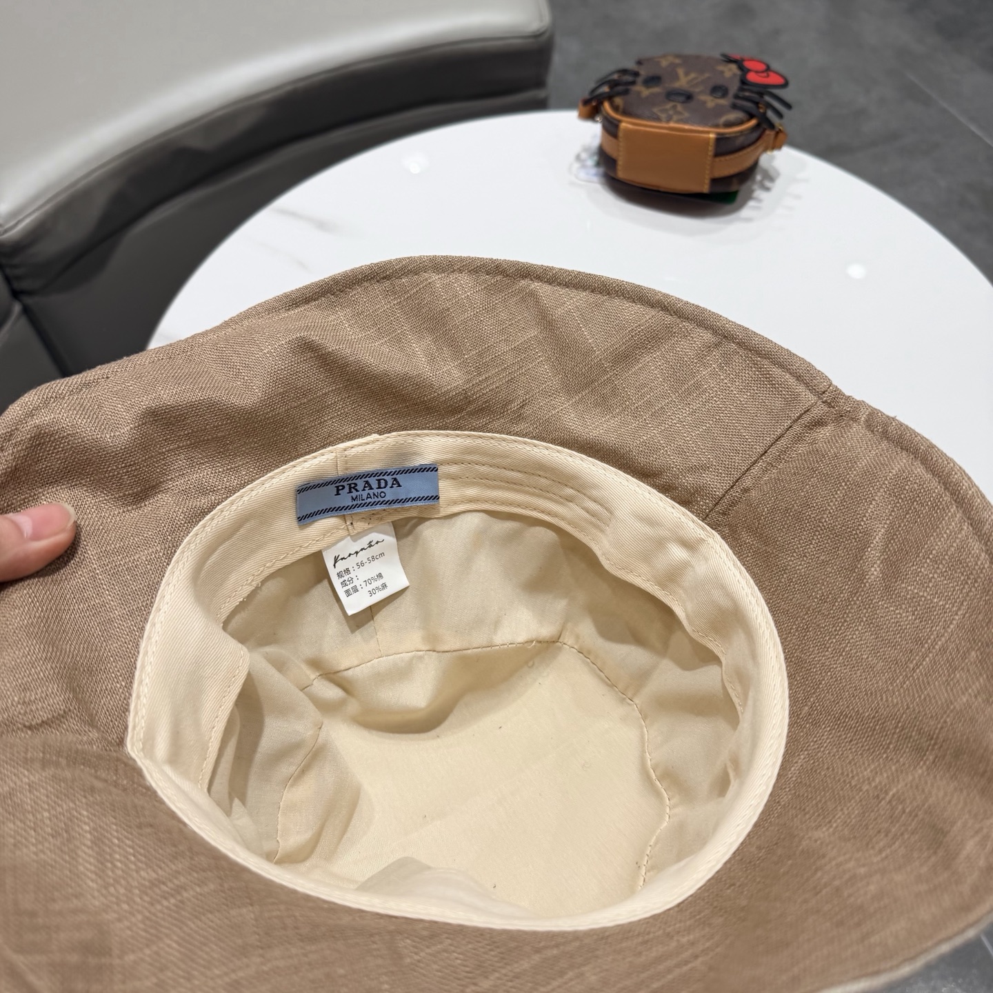 普拉达Prada简约透气棉麻渔夫帽中青年女士春夏季素颜百搭显脸小防晒盆帽