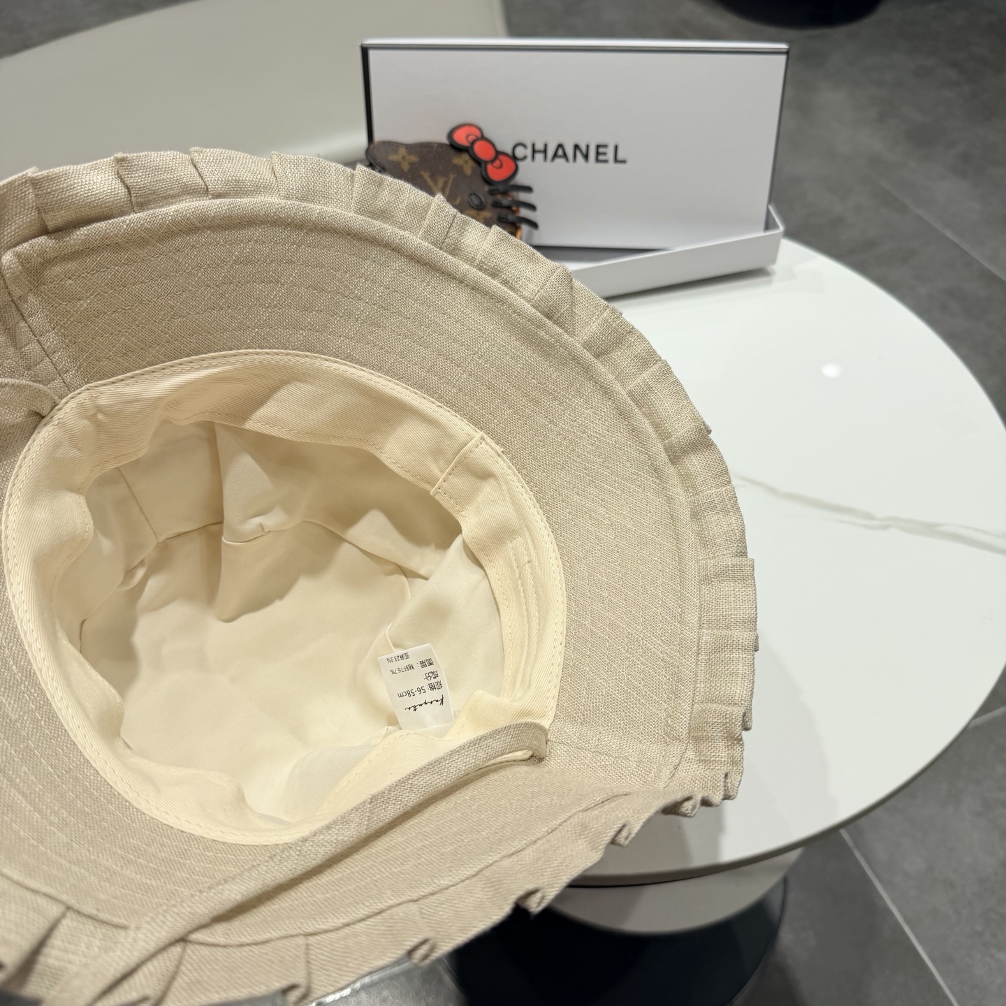 Chanel日系亚麻防紫外线系带渔夫帽女26春夏气质款透气显脸小出游遮脸帽