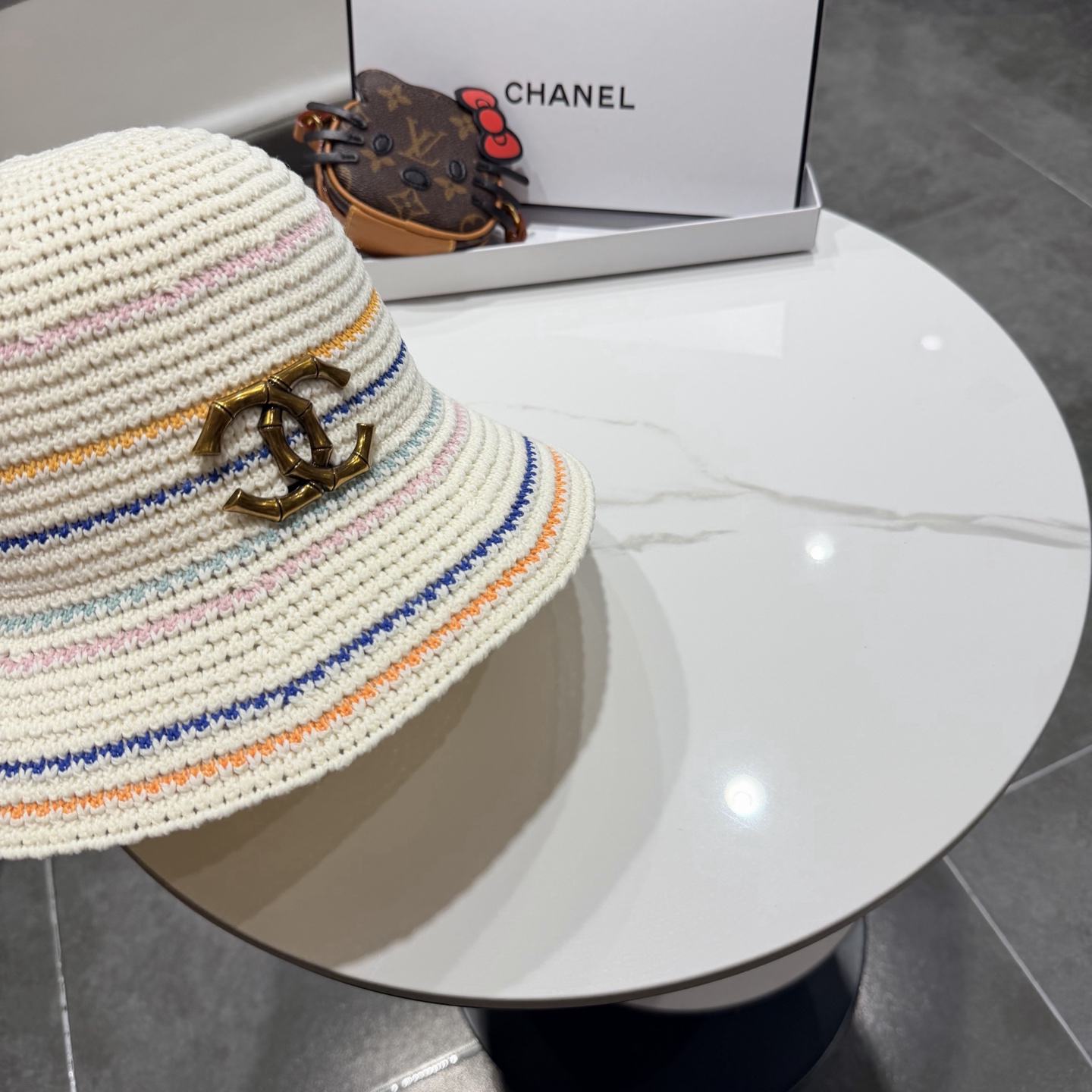 Chanel香奈儿针织渔夫帽镂空透气显脸小防晒水桶帽女款条纹海边沙滩遮阳太阳帽
