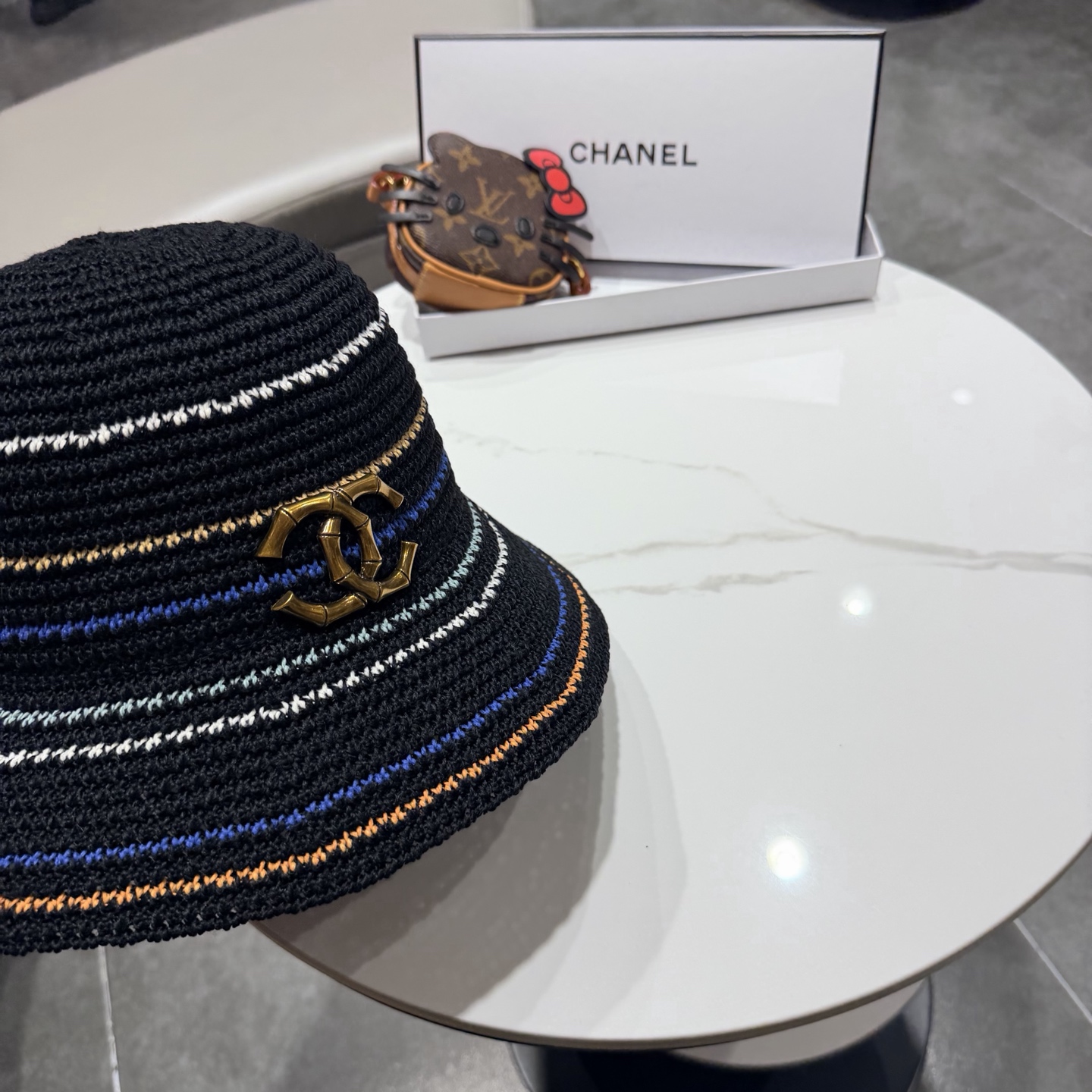 Chanel香奈儿针织渔夫帽镂空透气显脸小防晒水桶帽女款条纹海边沙滩遮阳太阳帽