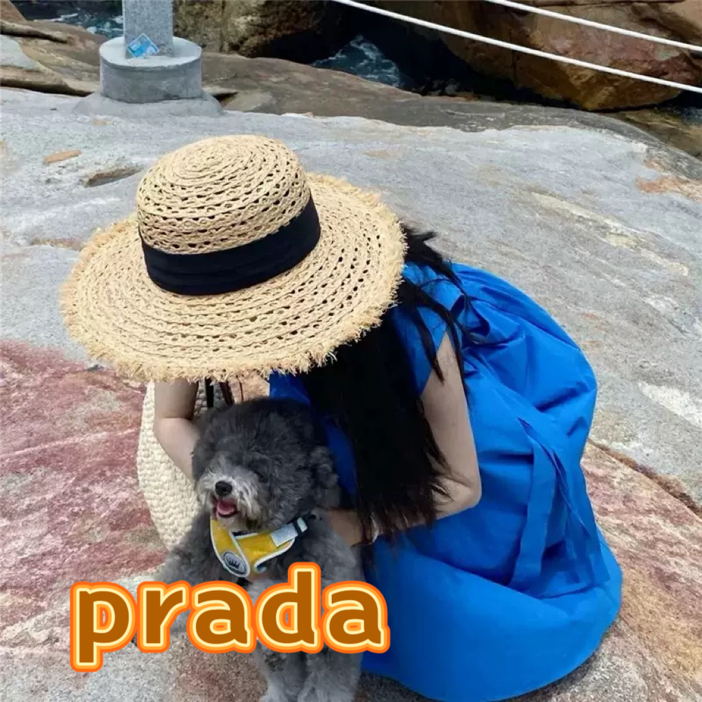 普拉达Prada新款草帽女夏天然拉菲草法式平顶遮阳帽度假大檐防晒镂空太阳帽子
