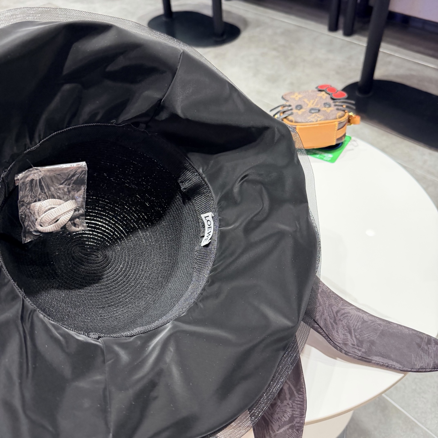 罗意威夏季国风草编蝴蝶结遮阳帽子女大檐防晒帽优雅度假防紫外线沙滩帽