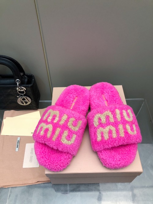 Miu Miu Shearling Slides with Logo | Warm, Comfortable, and Stylish 1 Miu Miu Shearling Slides with Logo | Warm, Comfortable, and Stylish