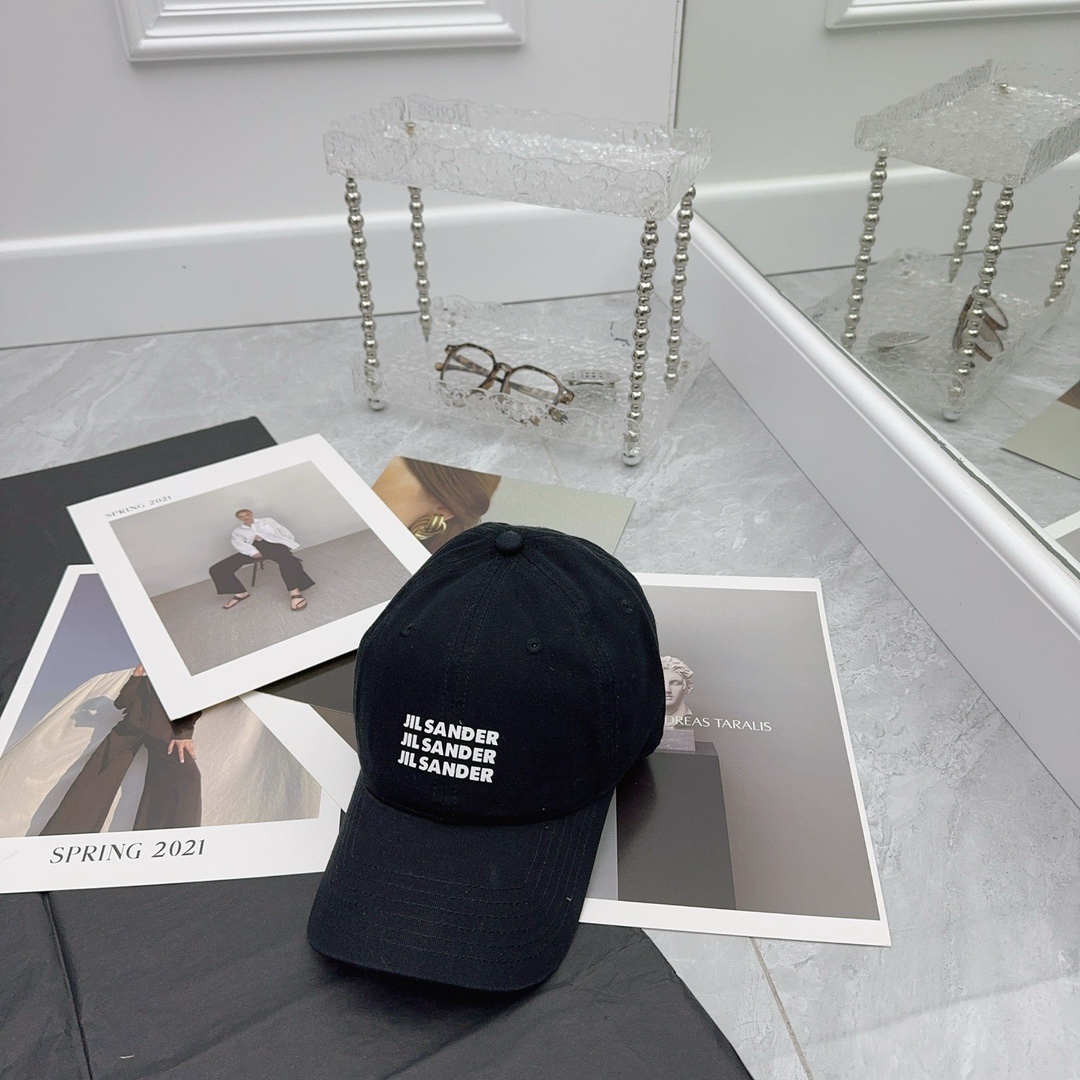 84 runs. jil sander pops a baseball cap. advanced color, same sex