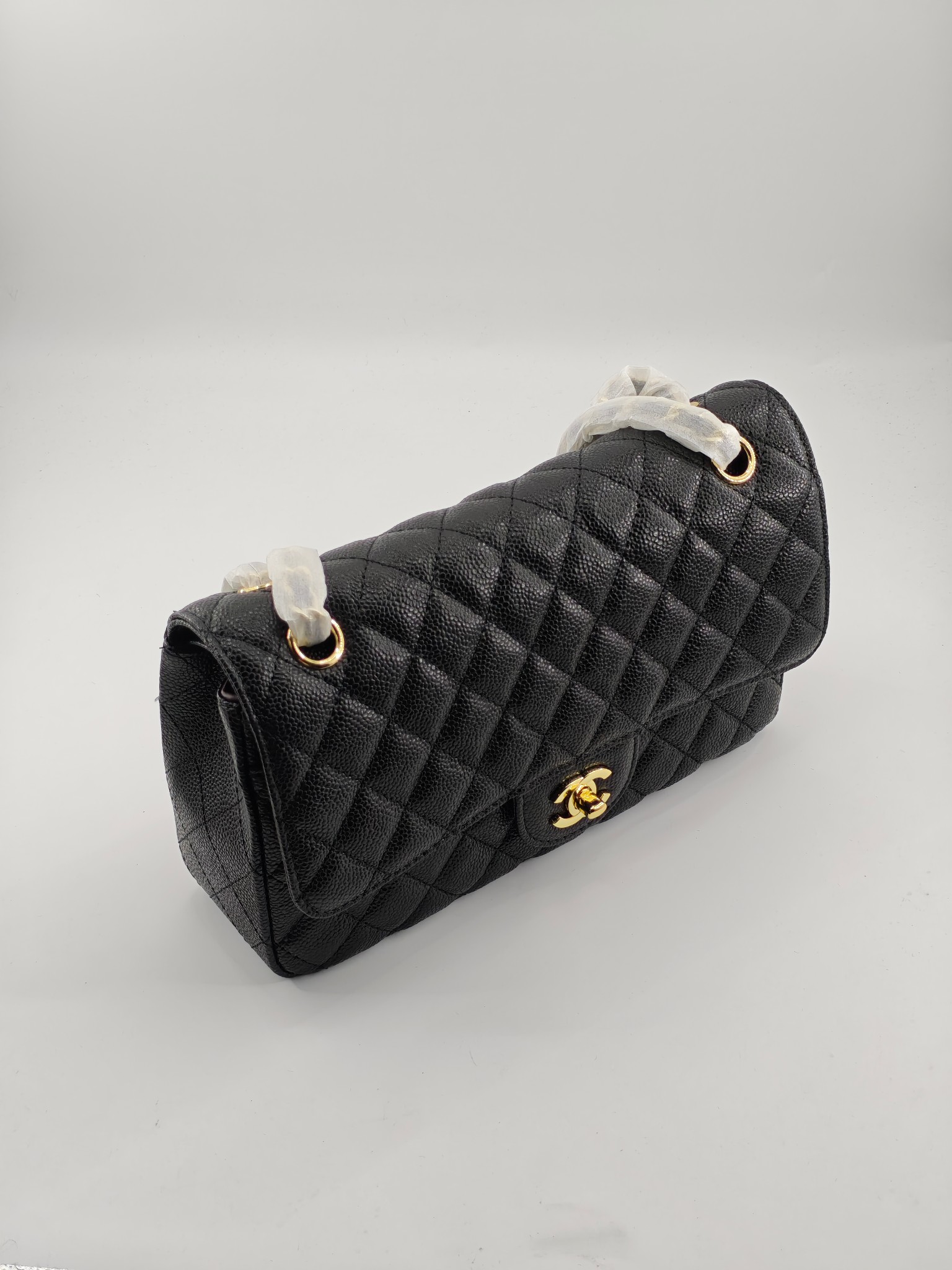 升级版CF中号
黑色鱼子酱金扣
实物实拍
款号：1112
尺寸：25.5X16X7 

