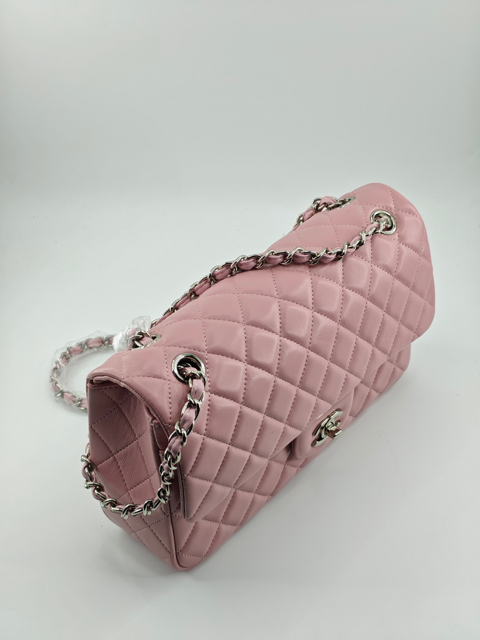 升级版CF中号
粉色头层羊皮银扣
实物实拍
款号：1112
尺寸：25.5X16X7 
