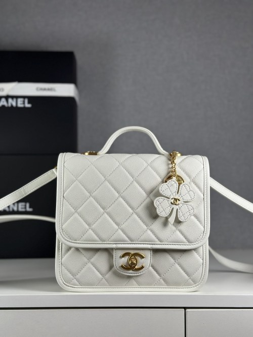 Chanel White Quilted Leather Backpack with Clover Charm - Stylish & Versatile 1 Chanel White Quilted Leather Backpack with Clover Charm - Stylish & Versatile